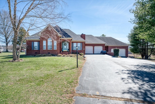 view of front of property featuring brick siding, a front yard, a chimney, a garage, and crawl space