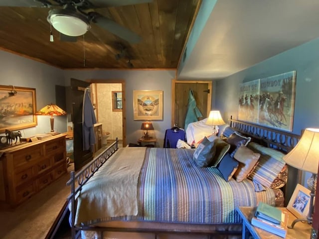 carpeted bedroom featuring wood ceiling