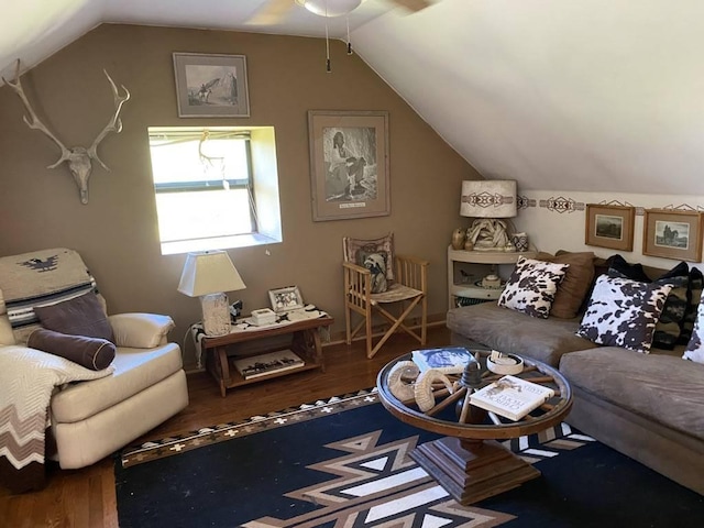 interior space with lofted ceiling and wood finished floors