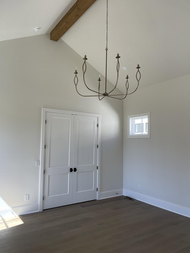 unfurnished dining area featuring beamed ceiling, baseboards, high vaulted ceiling, and dark wood-style flooring