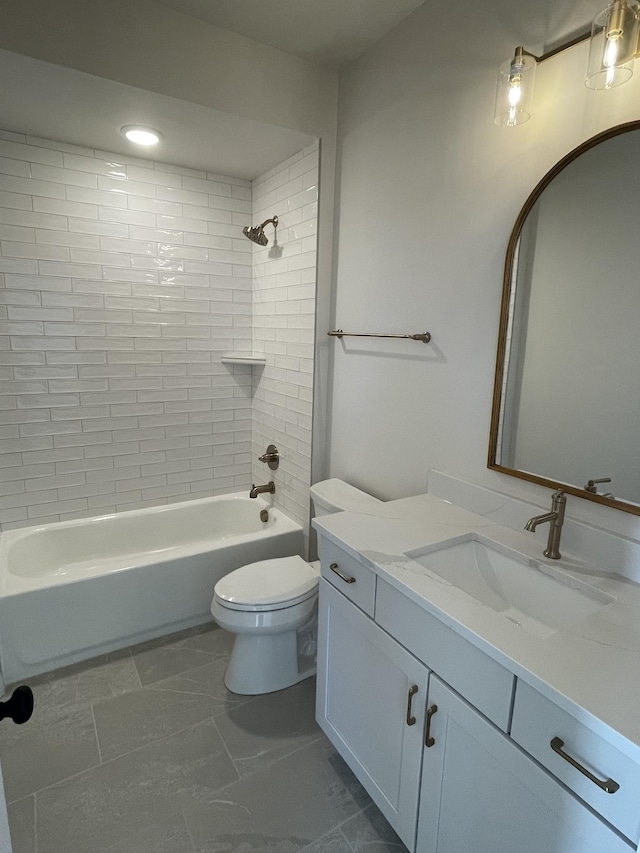 bathroom with vanity, toilet, and tub / shower combination