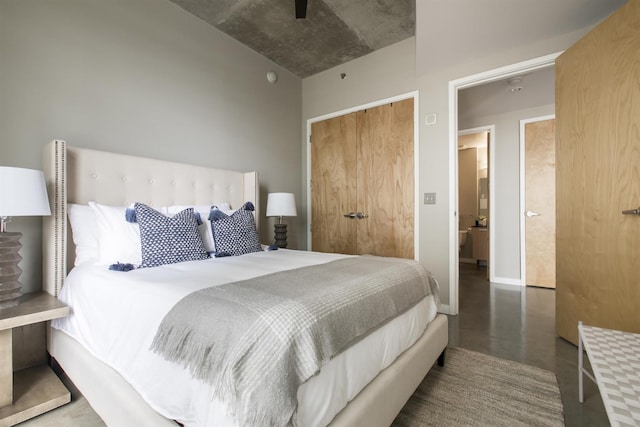 bedroom with baseboards and a closet