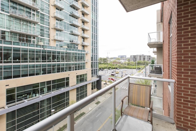 balcony featuring a view of city