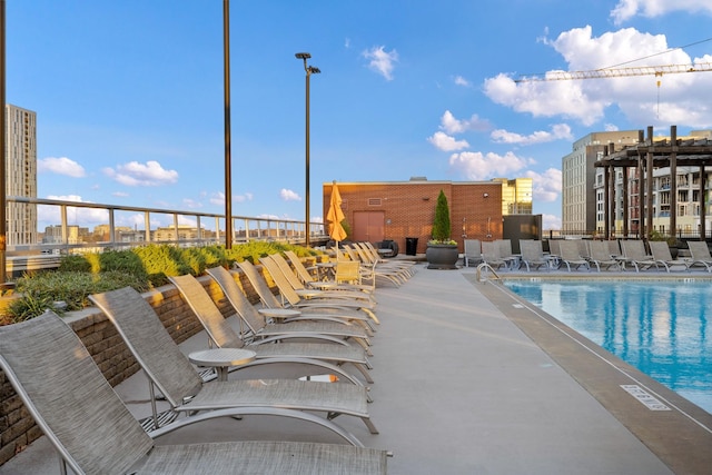 community pool with a city view