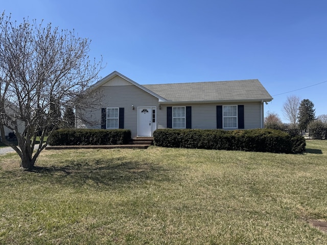 single story home with a front lawn