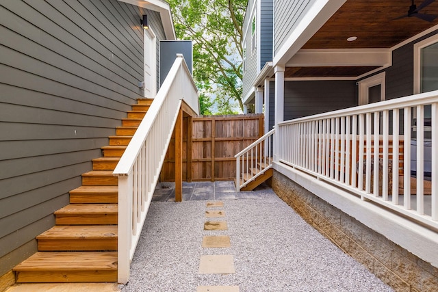 exterior space featuring stairs and fence