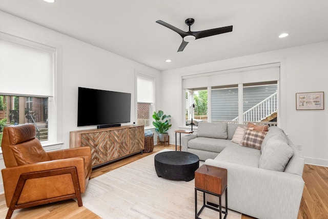 living room with recessed lighting, baseboards, wood finished floors, and a ceiling fan