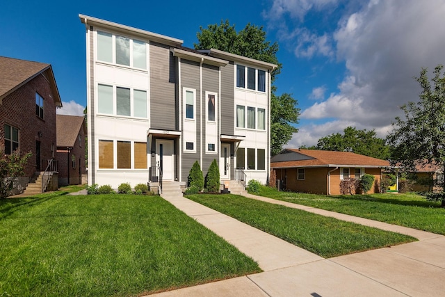 view of front of home featuring a front lawn