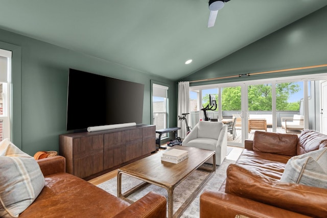 living area with recessed lighting, light wood-style flooring, ceiling fan, and vaulted ceiling