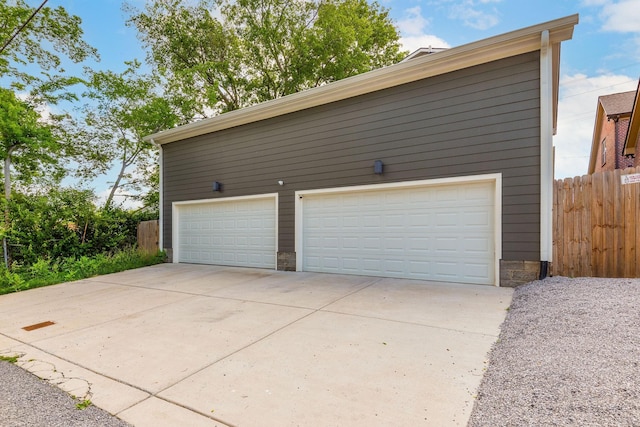 detached garage with fence