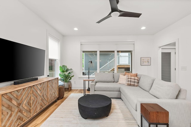 living area featuring recessed lighting, light wood-style flooring, baseboards, and a ceiling fan