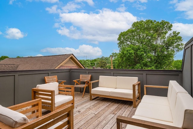 wooden deck featuring an outdoor living space