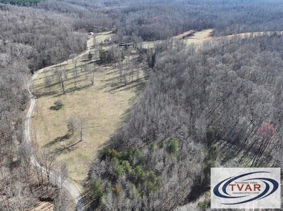 aerial view featuring a forest view