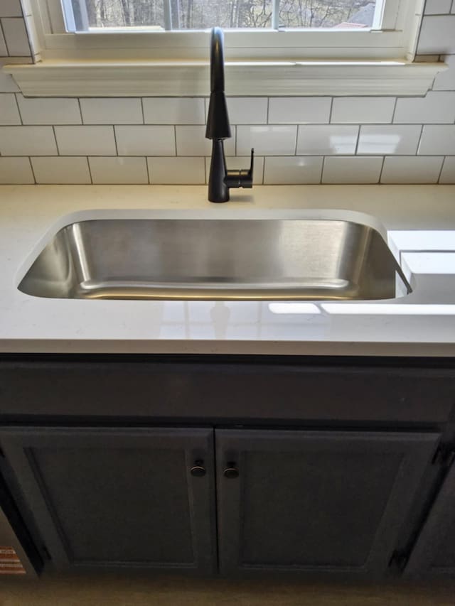 room details with a sink and backsplash