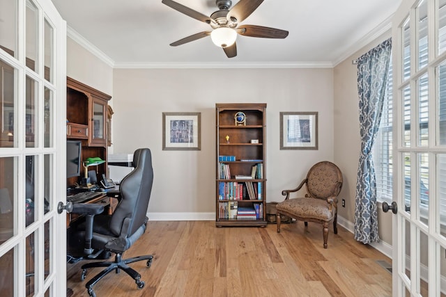 home office with crown molding, french doors, light wood-type flooring, and baseboards