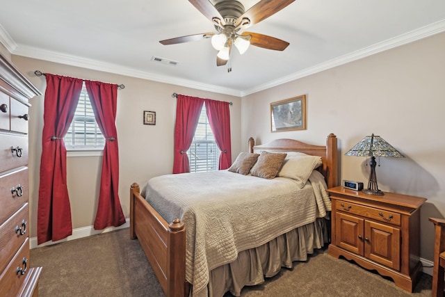 bedroom with dark colored carpet, visible vents, multiple windows, and ornamental molding