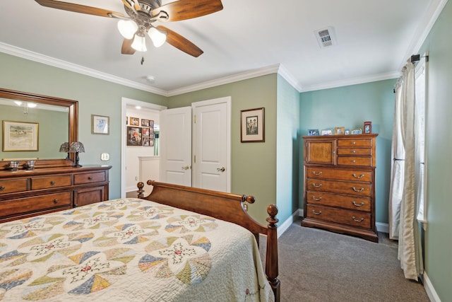 carpeted bedroom with visible vents, a ceiling fan, crown molding, and baseboards