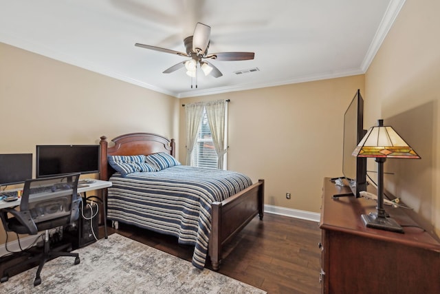 bedroom with crown molding, wood finished floors, visible vents, and baseboards