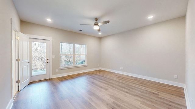 spare room with light wood finished floors, visible vents, ceiling fan, baseboards, and recessed lighting