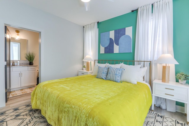 bedroom with light wood-type flooring