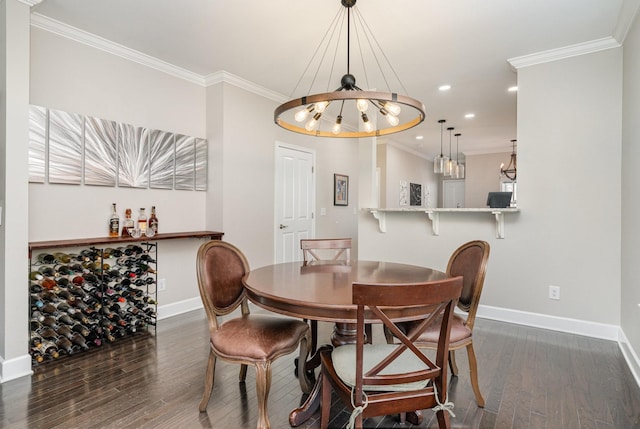 dining space with baseboards, dark wood-type flooring, and crown molding