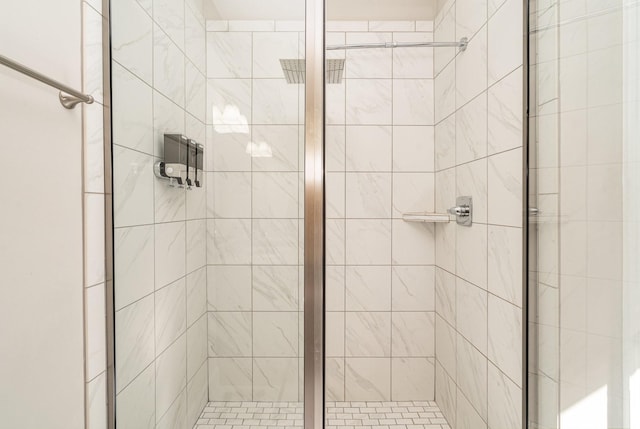 bathroom with a shower stall