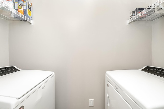 laundry area featuring laundry area and washing machine and dryer