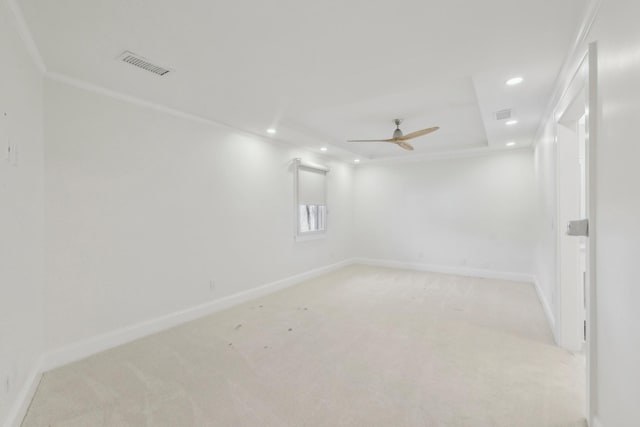 empty room with visible vents, baseboards, recessed lighting, ceiling fan, and light colored carpet