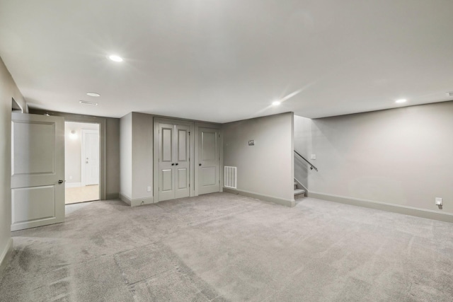 interior space featuring stairs, recessed lighting, baseboards, and visible vents