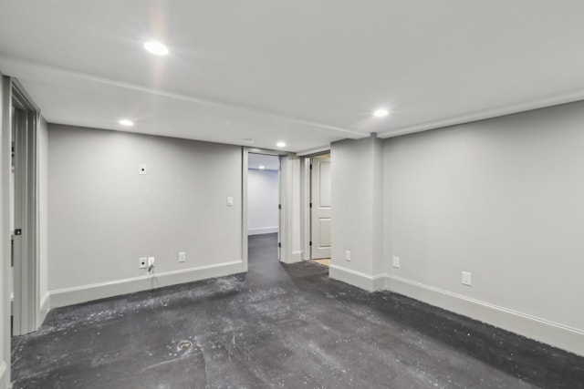 finished basement with recessed lighting and baseboards