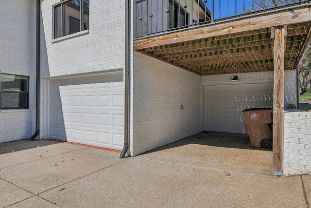 exterior space featuring concrete driveway