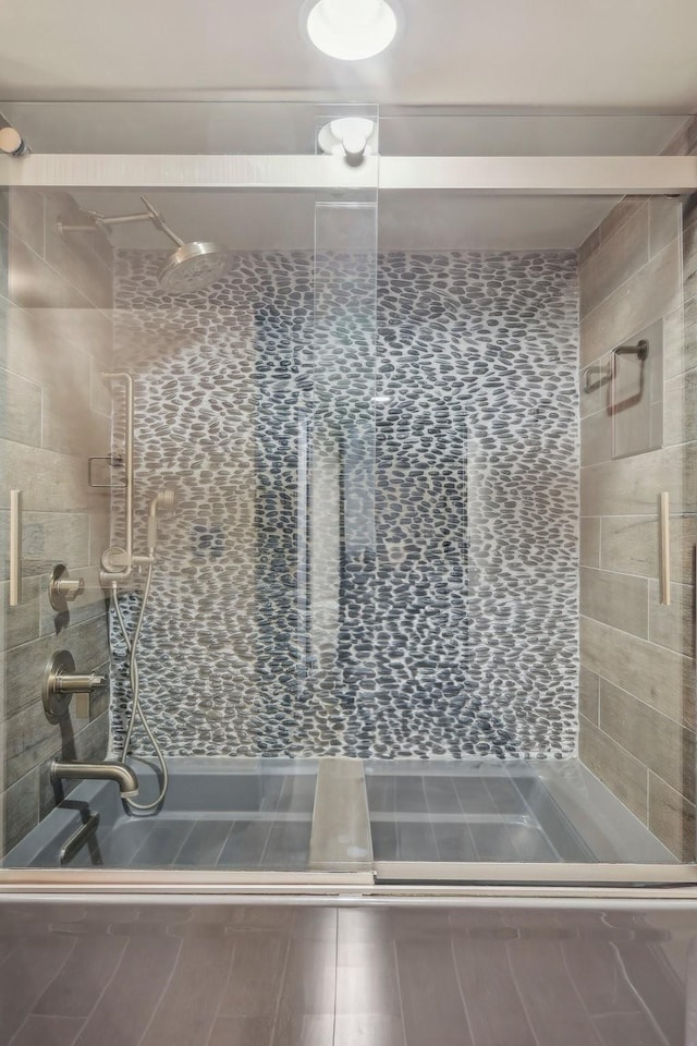 full bathroom with a stall shower