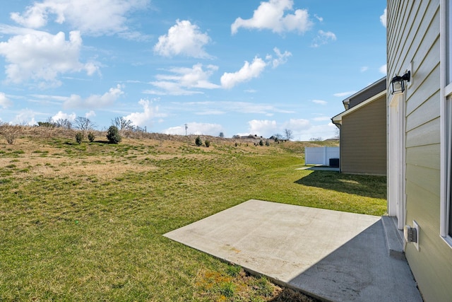 view of yard with a patio area