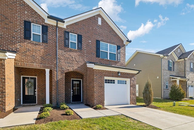 traditional-style home with brick siding, concrete driveway, and a garage