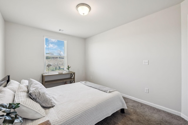 bedroom featuring carpet flooring, baseboards, and visible vents