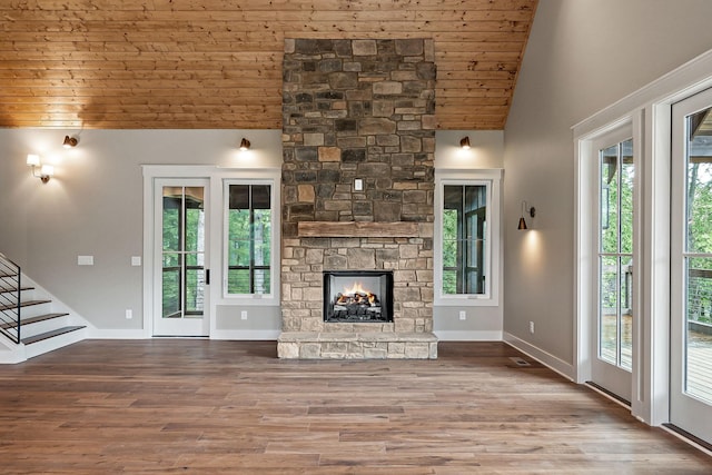 1036 Hidden River Rd, Rock Island, TN 38581 - unfurnished living room featuring wooden ceiling, high vaulted ceiling, wood finished floors, baseboards, and stairway