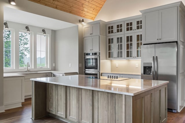 1036 Hidden River Rd, Rock Island, TN 38581 - kitchen with appliances with stainless steel finishes, vaulted ceiling, a sink, dark wood-style flooring, and wooden ceiling