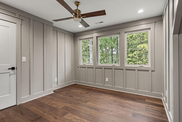 1036 Hidden River Rd, Rock Island, TN 38581 - spare room featuring a decorative wall, dark wood-type flooring, ceiling fan, and recessed lighting