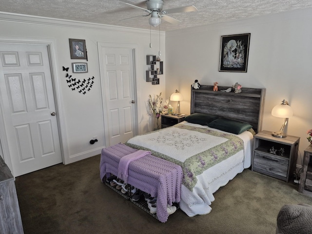 bedroom with ornamental molding, a ceiling fan, a textured ceiling, carpet flooring, and baseboards