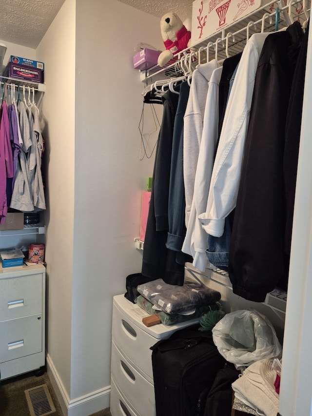 walk in closet featuring visible vents