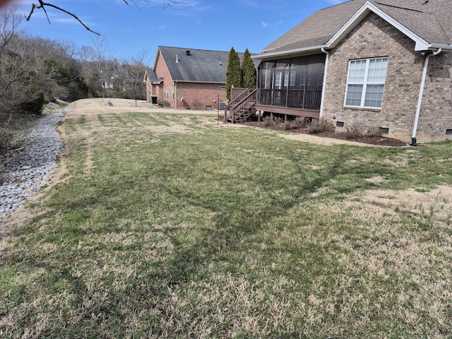 view of yard with a sunroom