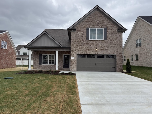 view of front of house with a porch, concrete driveway, an attached garage, a front yard, and brick siding