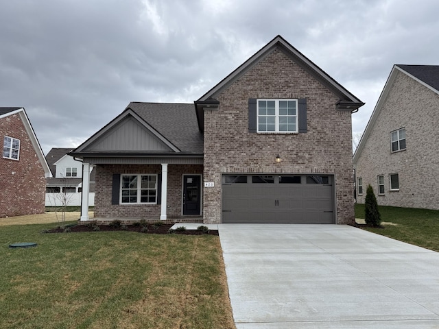 view of front of home with brick siding, an attached garage, concrete driveway, and a front yard