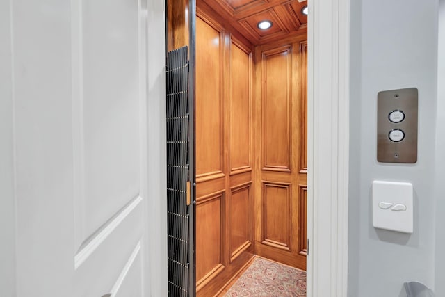 interior details with recessed lighting and elevator