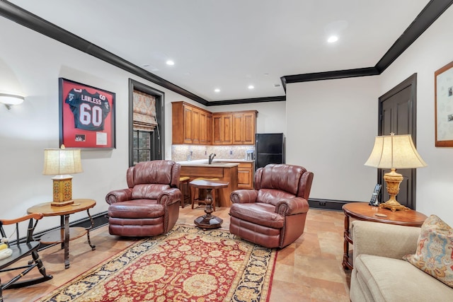 living area featuring crown molding and recessed lighting