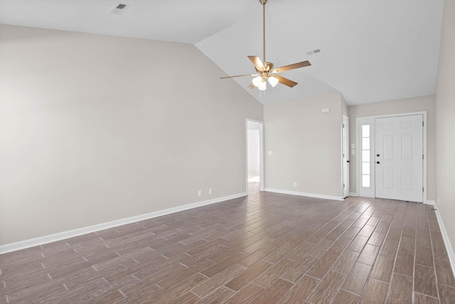 interior space with ceiling fan, wood finished floors, visible vents, and baseboards