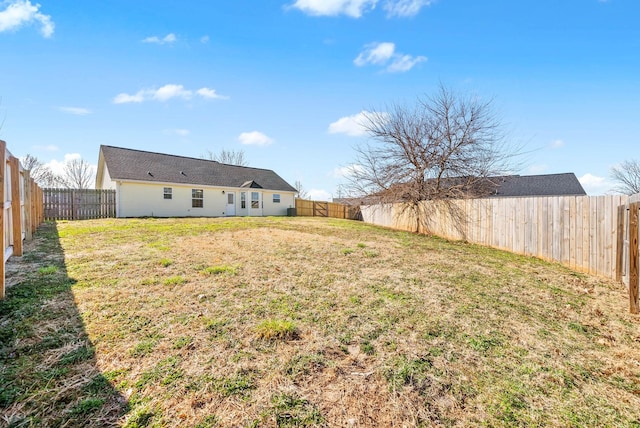 view of yard featuring a fenced backyard