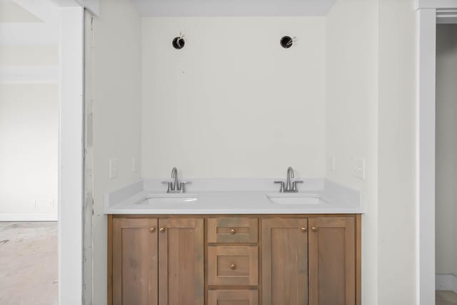 bathroom with double vanity and a sink