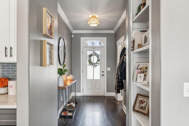 mudroom with baseboards, crown molding, and dark wood-type flooring