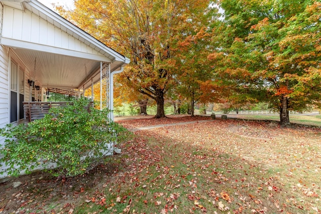 view of yard with a porch